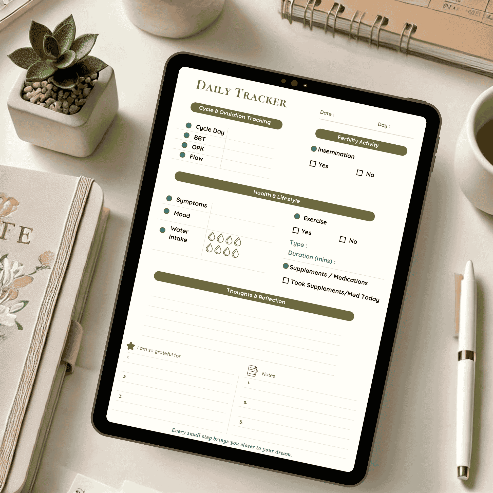 Tablet displaying the Daily Tracker page from the Tiny Dreams TTC Planner, with sections for cycle and ovulation tracking, health and lifestyle monitoring, and space for gratitude, notes, and reflections. Styled with a cozy desk setup featuring a notebook, pen, and plants